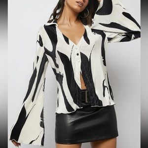Silky crinkled button front black and white patterned top